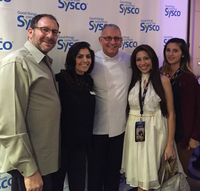 Manal Iskander with Kevin Hourican, president of Sysco Foods, and Robert Irvine